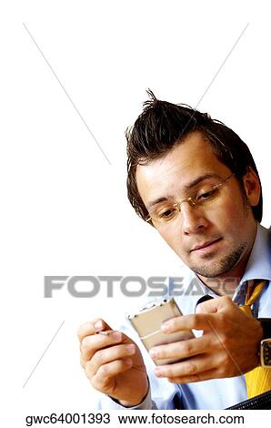 Close-up of a businessman operating a personal data assistant View Large Photo Image Stock Image - Close-up of a businessman operating a personal data assistant. Fotosearch