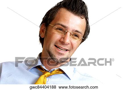 Close-up of a businessman smiling View Large Photo Image Stock Photo - Close-up of a businessman smiling. Fotosearch