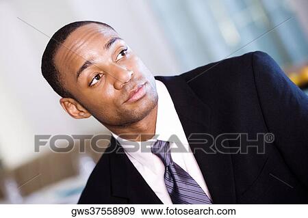Close-up of a businessman View Large Photo Image Stock Photo - Close-up of a businessman. Fotosearch