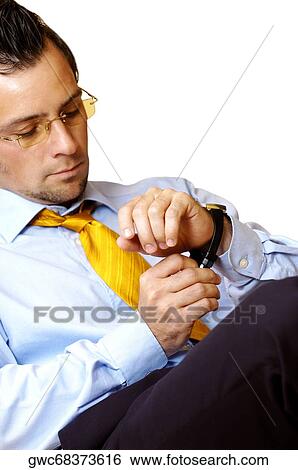Close-up of a businessman wearing a wristwatch View Large Photo Image Stock Photograph - Close-up of a businessman wearing a wristwatch. Fotosearch