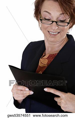 Close-up of a businesswoman holding a file View Large Photo Image Stock Image - Close-up of a businesswoman holding a file. Fotosearch