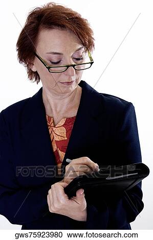 Close-up of a businesswoman holding a file View Large Photo Image Stock Image - Close-up of a businesswoman holding a file. Fotosearch