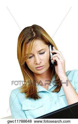 Stock Photo - Close-up of a businesswoman talking on a mobile phone. Fotosearch