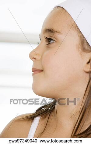 Close-up of a girl smiling View Large Photo Image Stock Image - Close-up of a girl smiling. Fotosearch