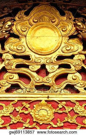 Close-up of a golden carved structure View Large Photo Image Stock Photo - Close-up of a golden carved structure. Fotosearch
