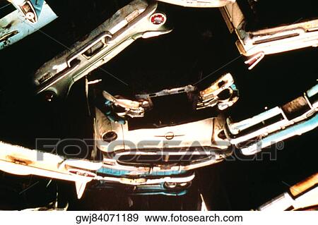 Close-up of a heap of cars in a junkyard View Large Photo Image Stock Photo - Close-up of a heap of cars in a junkyard. Fotosearch