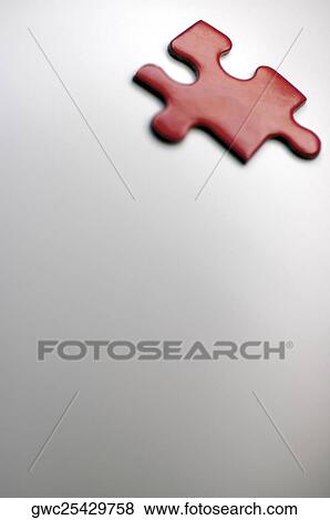 Stock Photo - Close-up of a jigsaw piece. Fotosearch