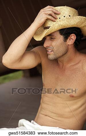 Close-up of a mid adult man looking serious View Large Photo Image Stock Image - Close-up of a mid adult man looking serious. Fotosearch