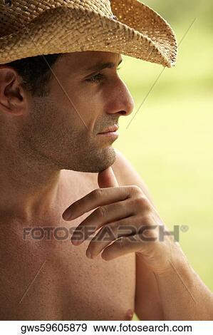 Close-up of a mid adult man looking serious View Large Photo Image Stock Photo - Close-up of a mid adult man looking serious. Fotosearch