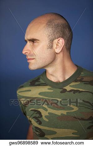 Stock Photo - Close-up of a mid adult man. Fotosearch