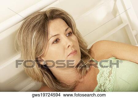Close-up of a mid adult woman View Large Photo Image Picture - Close-up of a mid adult woman. Fotosearch