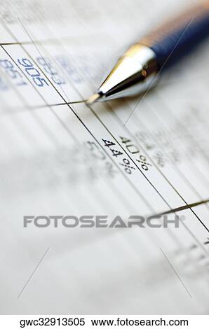Close-up of a pen on paper View Large Photo Image Stock Photography - Close-up of a pen on paper. Fotosearch