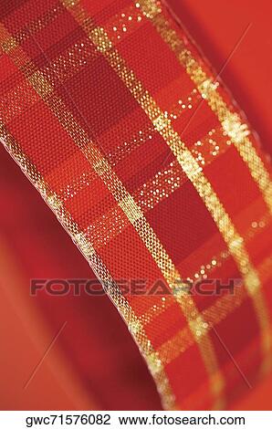 Close-up of a red ribbon View Large Photo Image Stock Image - Close-up of a red ribbon. Fotosearch