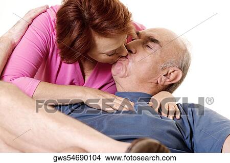 Close-up of a senior couple kissing View Large Photo Image Picture - Close-up of a senior couple kissing. Fotosearch