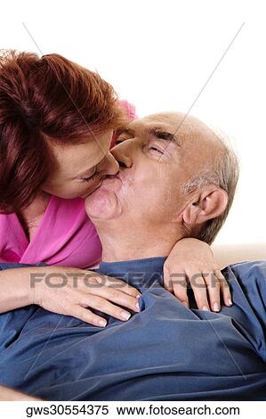Close-up of a senior couple kissing View Large Photo Image Stock Photography - Close-up of a senior couple kissing. Fotosearch