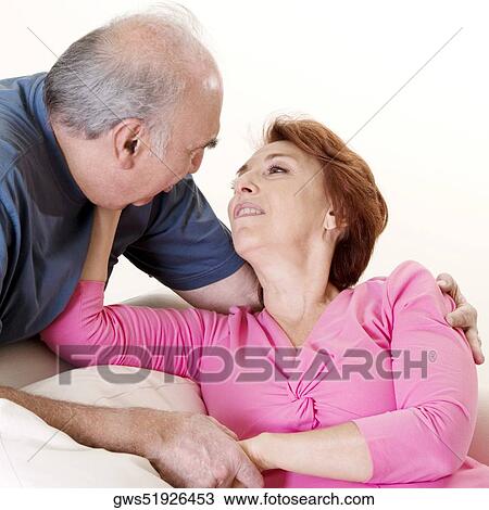 Close-up of a senior couple looking at each other View Large Photo Image Stock Image - Close-up of a senior couple looking at each other. Fotosearch
