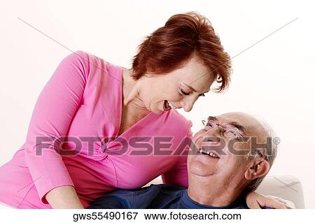 Close-up of a senior couple smiling View Large Photo Image Stock Photo - Close-up of a senior couple smiling. Fotosearch