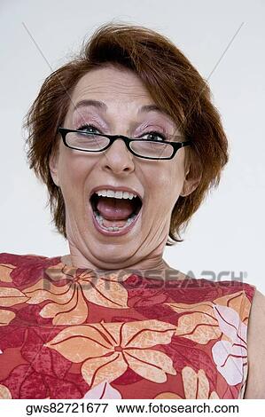 Stock Photo - Close-up of a senior woman making a face. Fotosearch
