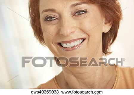 Stock Photo - Close-up of a senior woman smiling. Fotosearch