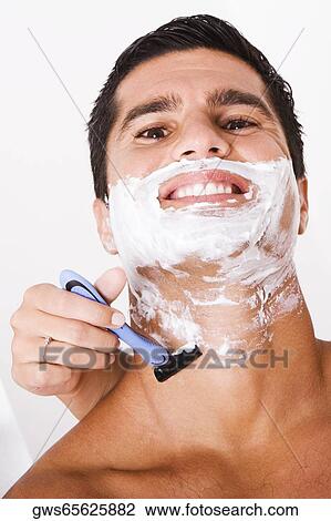 Close-up of a woman's hand shaving a mid adult man View Large Photo Image Stock Image - Close-up of a woman's hand shaving a mid adult man. Fotosearch