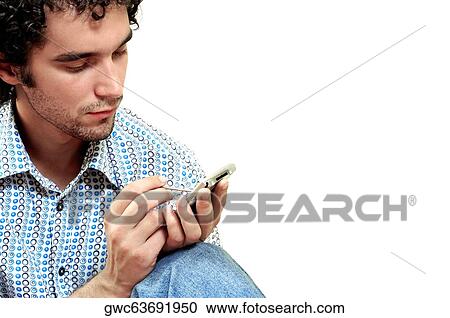 Close-up of a young man operating a personal data assistant View Large Photo Image Stock Image - Close-up of a young man operating a personal data assistant. Fotosearch