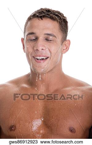 Close-up of a young man with water dripping from his face View Large Photo Image Stock Image - Close-up of a young man with water dripping from his face. Fotosearch