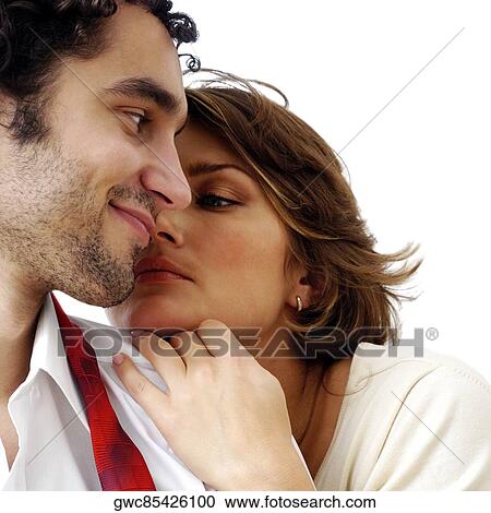 Stock Image - Close-up of a young woman leaning on a young man. Fotosearch