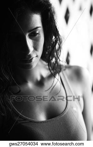 Close-up of a young woman View Large Photo Image Picture - Close-up of a young woman. Fotosearch
