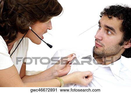 Close-up of a young woman pulling the shirt of a young man View Large Photo Image Stock Image - Close-up of a young woman pulling the shirt of a young man. Fotosearch