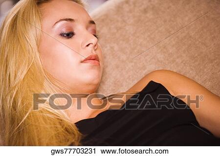 Close-up of a young woman View Large Photo Image Stock Image - Close-up of a young woman. Fotosearch