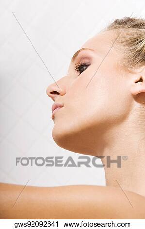 Close-up of a young woman View Large Photo Image Stock Image - Close-up of a young woman. Fotosearch