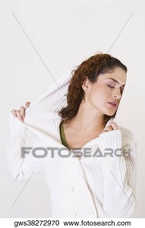 Close-up of a young woman with her eyes closed View Large Photo Image Stock Image - Close-up of a young woman with her eyes closed. Fotosearch