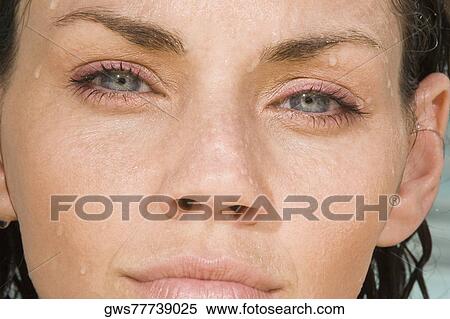 Stock Photography - Close-up of a young woman's face. Fotosearch