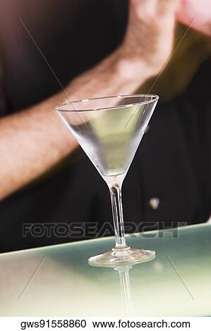 Stock Image - Close-up of an empty martini glass. Fotosearch