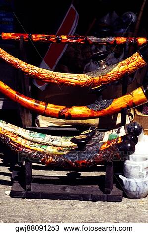 Close-up of carved elephant tusks on display View Large Photo Image Stock Image - Close-up of carved elephant tusks on display. Fotosearch