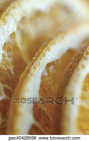 Stock Photo - Close-up of dried slices of lemon. Fotosearch