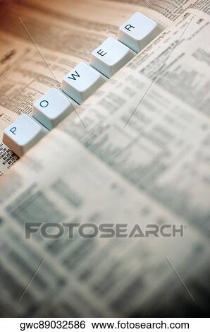 Close-up of five computer keys on a financial newspaper View Large Photo Image Stock Photograph - Close-up of five computer keys on a financial newspaper. Fotosearch