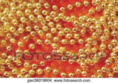 Close-up of golden beads View Large Photo Image Picture - Close-up of golden beads. Fotosearch