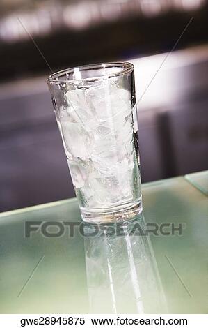 Close-up of ice cubes in a glass View Large Photo Image Stock Photography - Close-up of ice cubes in a glass. Fotosearch
