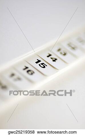Close-up of numbers on a personal organizer View Large Photo Image Stock Photo - Close-up of numbers on a personal organizer. Fotosearch