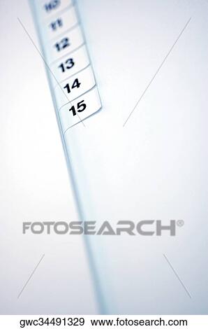 Close-up of numbers on a personal organizer View Large Photo Image Stock Photo - Close-up of numbers on a personal organizer. Fotosearch