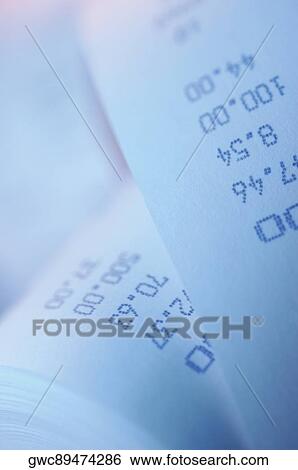 Close-up of numbers on a scroll receipt View Large Photo Image Stock Photograph - Close-up of numbers on a scroll receipt. Fotosearch