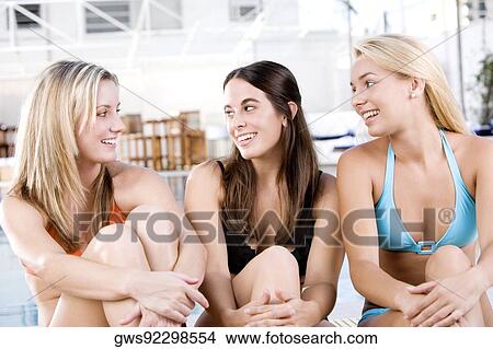 Close-up of three young women smiling View Large Photo Image Picture - Close-up of three young women smiling. Fotosearch