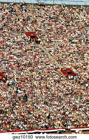Stock Image - Crowd at the Los Angeles Coliseum site of 1984 Olympics. Fotosearch