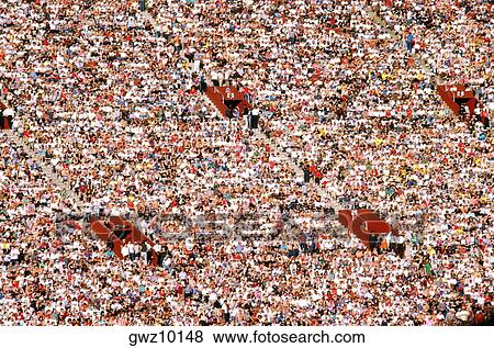 Stock Photo - Crowd at the Los Angeles Coliseum site of the 1984 Olympics. Fotosearch