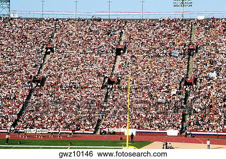 Crowd at the Los Angeles Coliseum Site of the 1984 Olympics View Large Photo Image Stock Photograph - Crowd at the Los Angeles Coliseum Site of the 1984 Olympics. Fotosearch