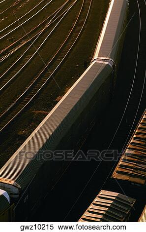 Freight cars and reflection on rails in Baltimore, MD View Large Photo Image Stock Photography - Freight cars and reflection on rails in Baltimore, MD. Fotosearch