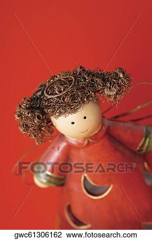 High angle view of an angel figurine View Large Photo Image Stock Image - High angle view of an angel figurine. Fotosearch