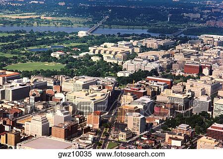 Stock Photography - High angle view of buildings beside a river, Washington DC, USA. Fotosearch