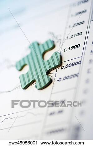 Jigsaw piece on a stock market report View Large Photo Image Stock Image - Jigsaw piece on a stock market report. Fotosearch